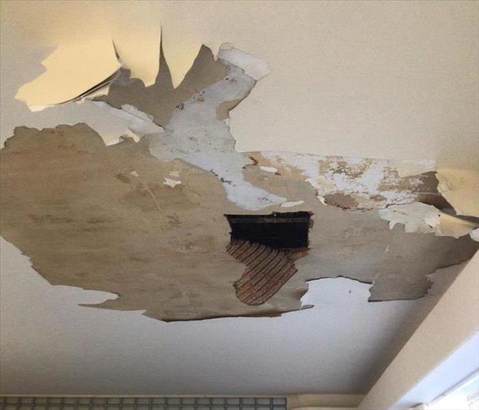 Large hole in ceiling