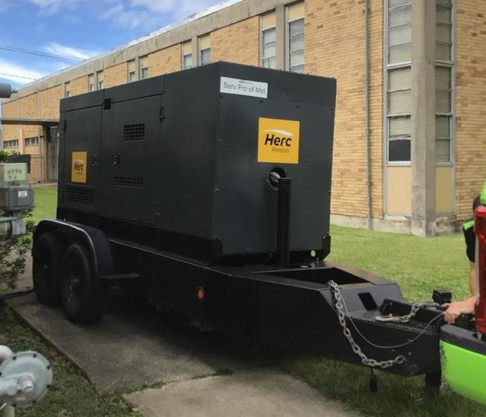 Commercial generator outside of business during a disaster